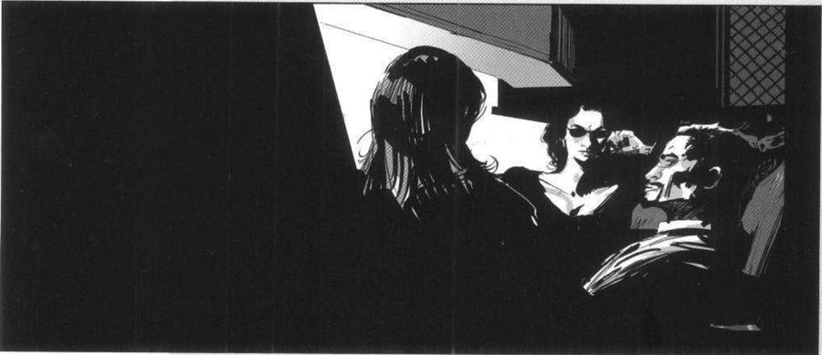 Three people in a dark room, lit faces at the right, a big dark shape filling the left.