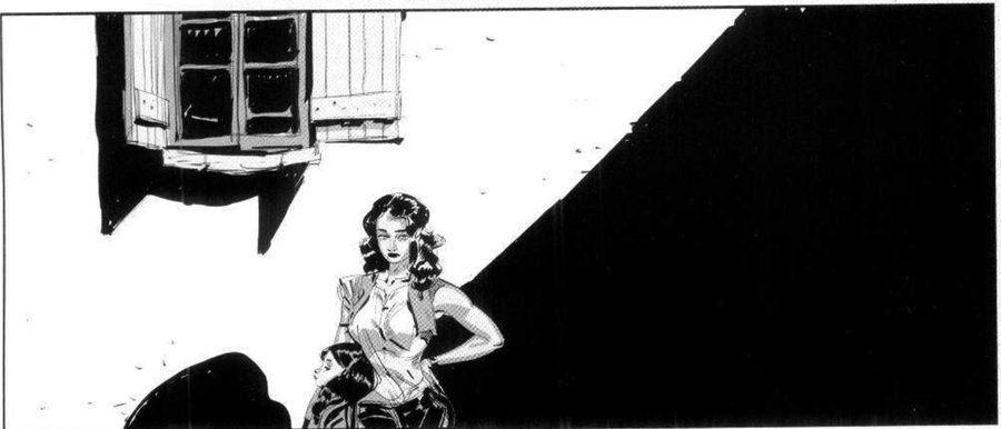 Two women low in the frame, a window above and a big dark diagonal shape on the right.