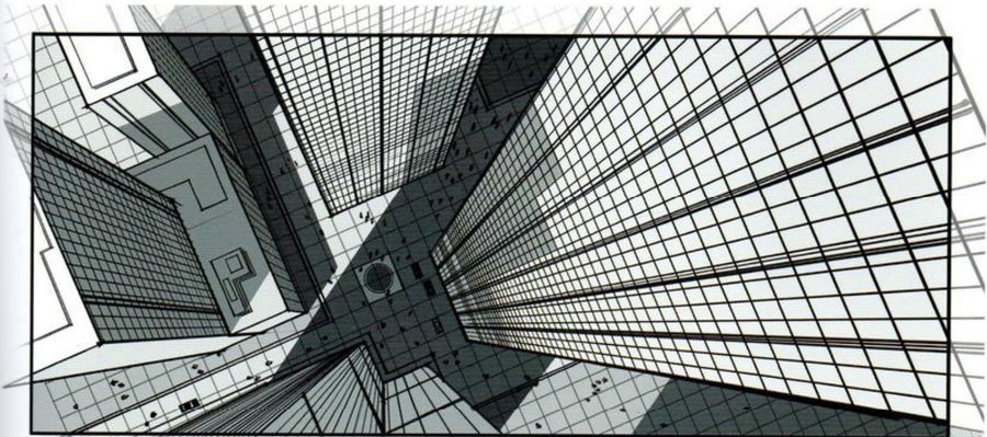 A view straight down between skyscrapers to a street.